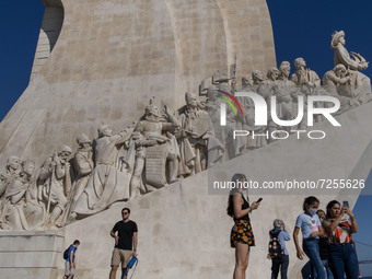 People walk around the Padrão dos Descobrimentos, in Belem, Portugal. October 20, 2021.  The Monument to the Discoveries (in Portuguese, Mon...