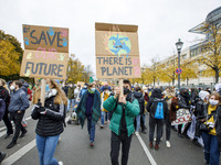 People take part in the ''Friday For Future'' demonstration, in Berlin, Germany, on October 22, 2021. (