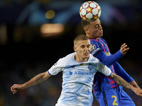 Sergiño Dest of Barcelona and Vitaliy Buyalskyi of Dinamo Kiev compete for the ball during the UEFA Champions League group E match between F...