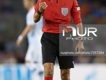 Referee Clement Turpin during the UEFA Champions League group E match between FC Barcelona and Dinamo Kiev at Camp Nou on October 20, 2021 i...