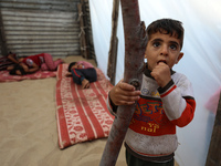 Palestinian children play in a slum on the outskirts of Khan Younis Refugee Camp, in the southern Gaza Strip, on October 23, 2021.
 (