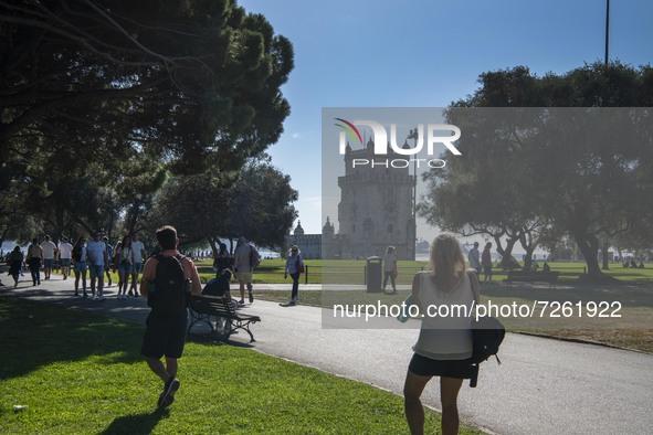 People visit the tourist area of the Belem Tower, in Lisbon. 20 October 2021. Most regions in mainland Portugal show an 