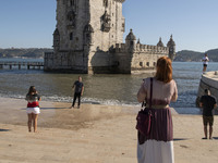 People visit the tourist area of the Belem Tower, in Lisbon. 20 October 2021. Most regions in mainland Portugal show an 
