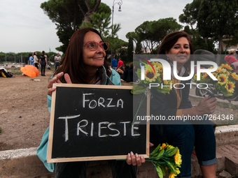 People protest against the Green pass in Ugo La Malfa square, Rome, Italy, 23 October 2021. The Italian government decided that starting 15...