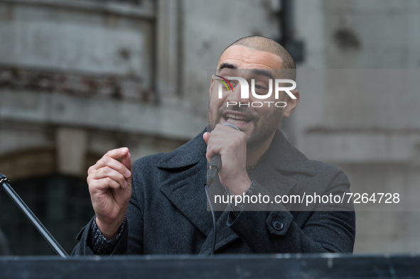 LONDON, UNITED KINGDOM - OCTOBER 23, 2021: British rapper and activist Lowkey speaks during a rally outside the Royal Courts of Justice in s...