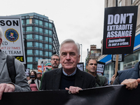 LONDON, UNITED KINGDOM - OCTOBER 23, 2021: Labour Party MP John McDonnell takes part in a march through central London in solidarity with Ju...