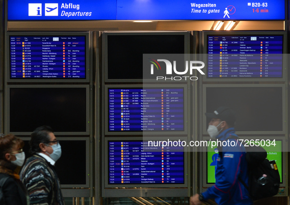 Passengers walking by a departure information board in the main Terminal at Frankfurt Airport.
On Monday, October 18, 2021, in Frankfurt Air...