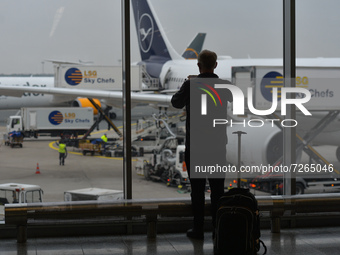 A passenger takes a photo of a Lufthansa aircraft at Frankfurt Airport.
On Monday, October 18, 2021, in Frankfurt Airport, near Kelsterbach,...