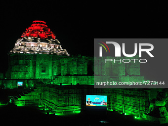 Konark Sun temple, one of an icon of the archaeological department lighting with national flag of the nation tricolor to celebrate the 100 c...