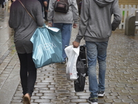 People carrying shopping bags in Manchester, England, on Tuesday 4th August 2015. (