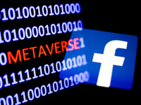 A binary code with the word 'metaverse' displayed on a laptop screen and Facebook logo displayed on a phone screen are seen in this multiple...