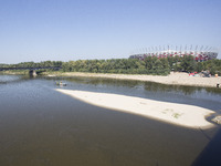Island in the middle of the river Vistula exposed by the low water level (