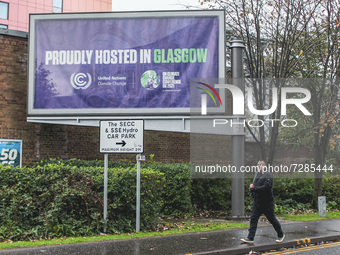 A pedestrian walks past a COP26 branded billboard near the Scottish Event Campus on September 1, 2021 in Glasgow, Scotland. The Scottish Eve...