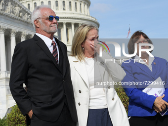 Captain Lee Rosbach(left), US Representatives Madeleine Dean(D-PA)(center) and Annie Kuster(D-NH)(right) during a press conference about com...