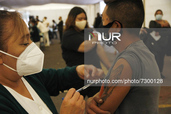 A person receives  a  Sputnik V dose vaccine during a mass vaccine campaign  against Covid19, ending the supply of vaccines to people over 1...