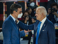 Pedro Sanchez, left, President of Spain, talks with Joe Biden, right, President of the United States, in the G20 Summit of Heads of State an...