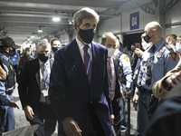 U.S. Special Presidential Envoy for Climate John Kerry walks though a corridor on day three of the COP 26 United Nations Climate Change Conf...
