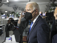 President Joe Biden walks though a corridor on day three of the COP 26 United Nations Climate Change Conference on November 02, 2021 in Glas...