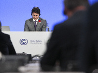 Canada's Prime Minister Justin Trudeau attends a meeting on day three of the COP 26 United Nations Climate Change Conference on November 02,...