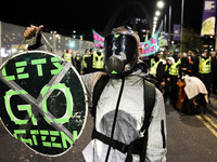 Extinction Rebellion protestors block the Cylde Arc bridge outside of the Scottish Event Campus on day three of the COP 26 United Nations Cl...