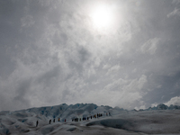 Tourists walks over the Perito Moreno Glacier in Los Glaciares National Park near El Calafate, Argentina, Tuesday, Nov. 2, 2021 (