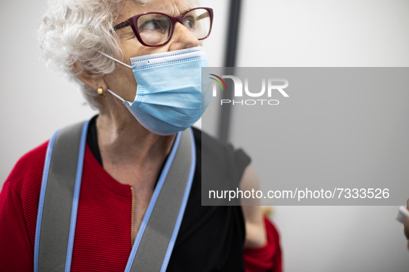 A women with is mask on in the office waiting for the vaccine, on November 4, 2021, in Lisbon, Portugal.
The third dose of the vaccine began...