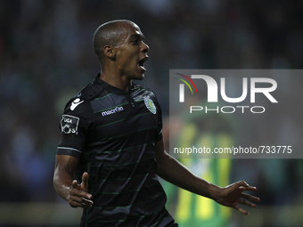 Sporting's Portuguese midfielder João Mário celebrates after scoring a goal during the Premier League 2015/16 match between CD Tondela and S...