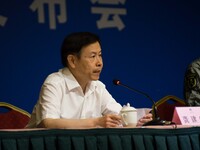 A government official briefing to the press about the latest number and rescue plan. - Chinese government officials hosted a press conferenc...