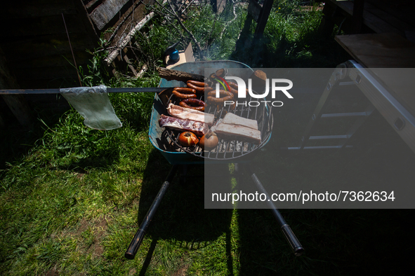 Purranque, Chile. November 8, 2021.-
A barbecue made on a wheelbarrow.
Images of the rural sector of the Los Lagos region, in Purranque, Chi...