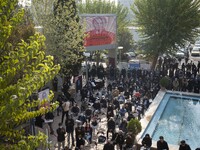 Iranian people and artists take part a funeral for Iranian cartoonist Kambiz Derambakhsh out of the Iranian Artists Forum in downtown Tehran...