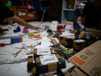 Craftsmen make crafts from cardboard, clay, and wax at the South Tangerang creative craft house, on November 11, 2021 (