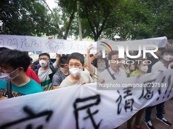 Most of the protesters wearing masks to prevent themselves from inhaling the toxic air which are believed to be above safety standard.  - Hu...