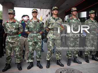 HAn unit of the Chinese Liberation Army is being deployed to guard the entrance of the Mayfair hotel to prevent protester from breaking into...