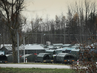 A large military camp and military vehicles are seen near Szudzialoowo, Poland on 13 November, 2021 in Warsaw, Poland. This week Belarus sen...