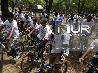  Bangladesh Cycling Club made a bi-cycle rally on the ocation of world Autism Awareness Day 2014 at Sohrawardi Uddayan, Dhaka, on April 4, 2...
