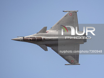 A French air force ( Armée de l'Air et de l'Espace Dassault Rafale solo display ) Dassault Rafale multirole combat fighter jet aircraft perf...