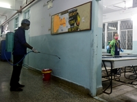 Sanitization of a high school ahead of re-opening amid coronavirus emergency in Kolkata, India, 15 November, 2021.  (