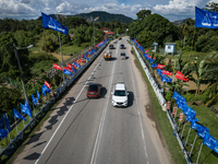 Vehicles drive past the Malacca River bridge full of political parties flags at Malacca, Malaysia, on November 19, 2021. Malacca’s state leg...