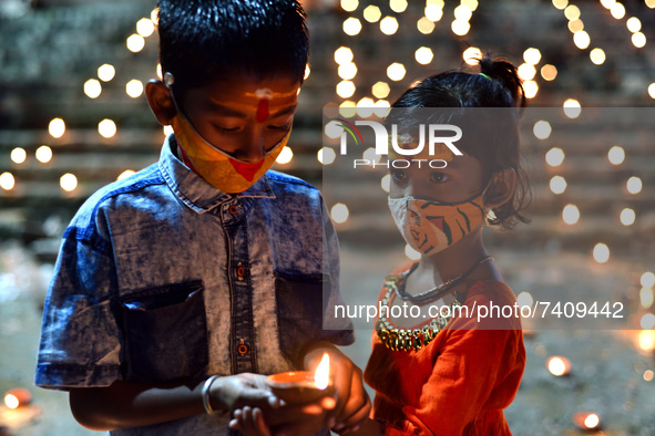 People during the Dev Deepwali celebration in Kolkata, India, on November 19, 2021. 