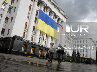 A huge flag of Ukraine was hung on the Presidential Administration building in Kiev, August 19, 2015 as Ukraine prepares to mark its Indepen...