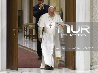 Pope Francis arrives in the Paul VI Hall for his weekly general audience at the Vatican, Wednesday, Nov. 24, 2021.  (