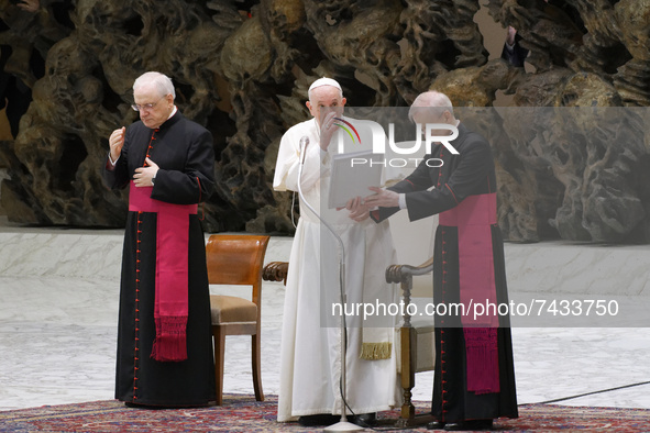 Pope Francis attends his weekly general audience in the Paul VI Hall at the Vatican, Wednesday, Nov. 24, 2021.  