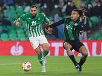 Borja Iglesias of Real Betis in action with Samy Mmaee of Ferencarosi TC during the UEFA Europa League Group G stage match between Real Beti...