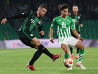 Marijan Cabraja of Ferencarosi TC in action with Diego Lainez of Real Betis during the UEFA Europa League Group G stage match between Real B...