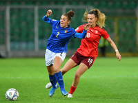 Italy's defender Valentina Bergamaschi compete for the ball with Switzerland's midfielder Riola Xhemaili during the FIFA World Cup Women'...