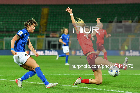 Italy's forward Valentina Giacinti is hindered by Switzerland's midfielder Riola Xhemaili during the FIFA World Cup Women's FIFA World C...