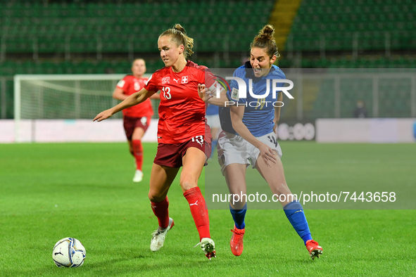Switzerland's midfielder Lia Walti compete for the ball with Italy's defender Martina Lenzini  during the FIFA World Cup Women's FIFA Wo...