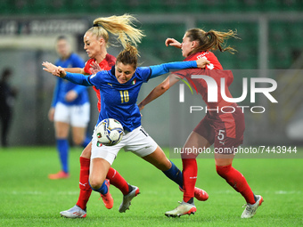 Italy's forward Cristiana Girelli compete for the ball with Switzerland's defender Moelle Maritz  during the FIFA World Cup Women's FIFA...