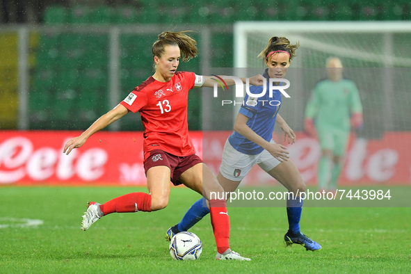 Switzerland's midfielder Lia Walti compete for the ball with Italy's forward Barbara Bonansea  during the FIFA World Cup Women's FIFA Wo...