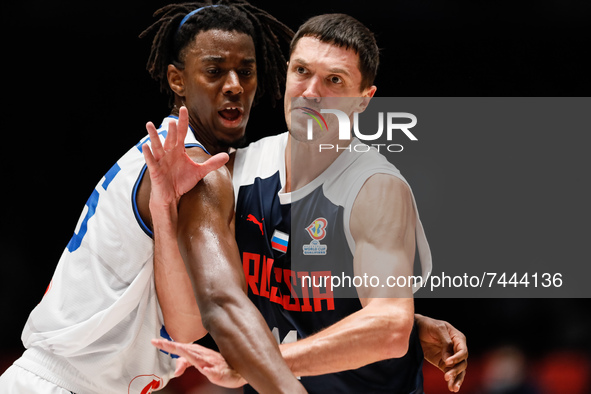 Semen Antonov (R) of Russia and Nicola Akele of Italy in action during the FIBA Basketball World Cup 2023 Qualifying Tournament match betwee...
